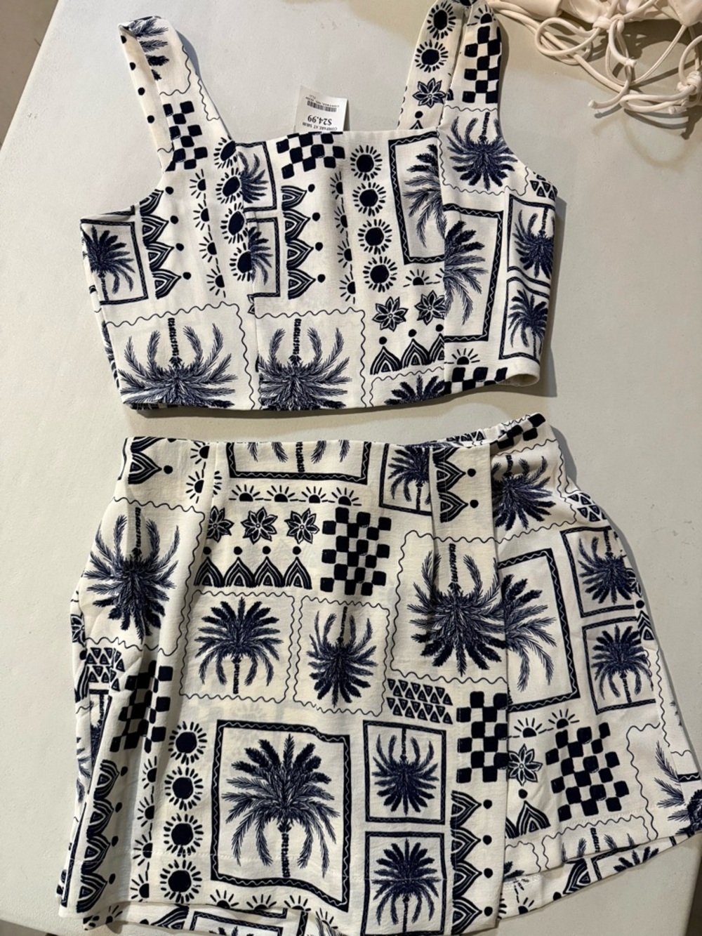 Monteau White and Navy Palm Print Two-Piece Crop Top and Skort Set